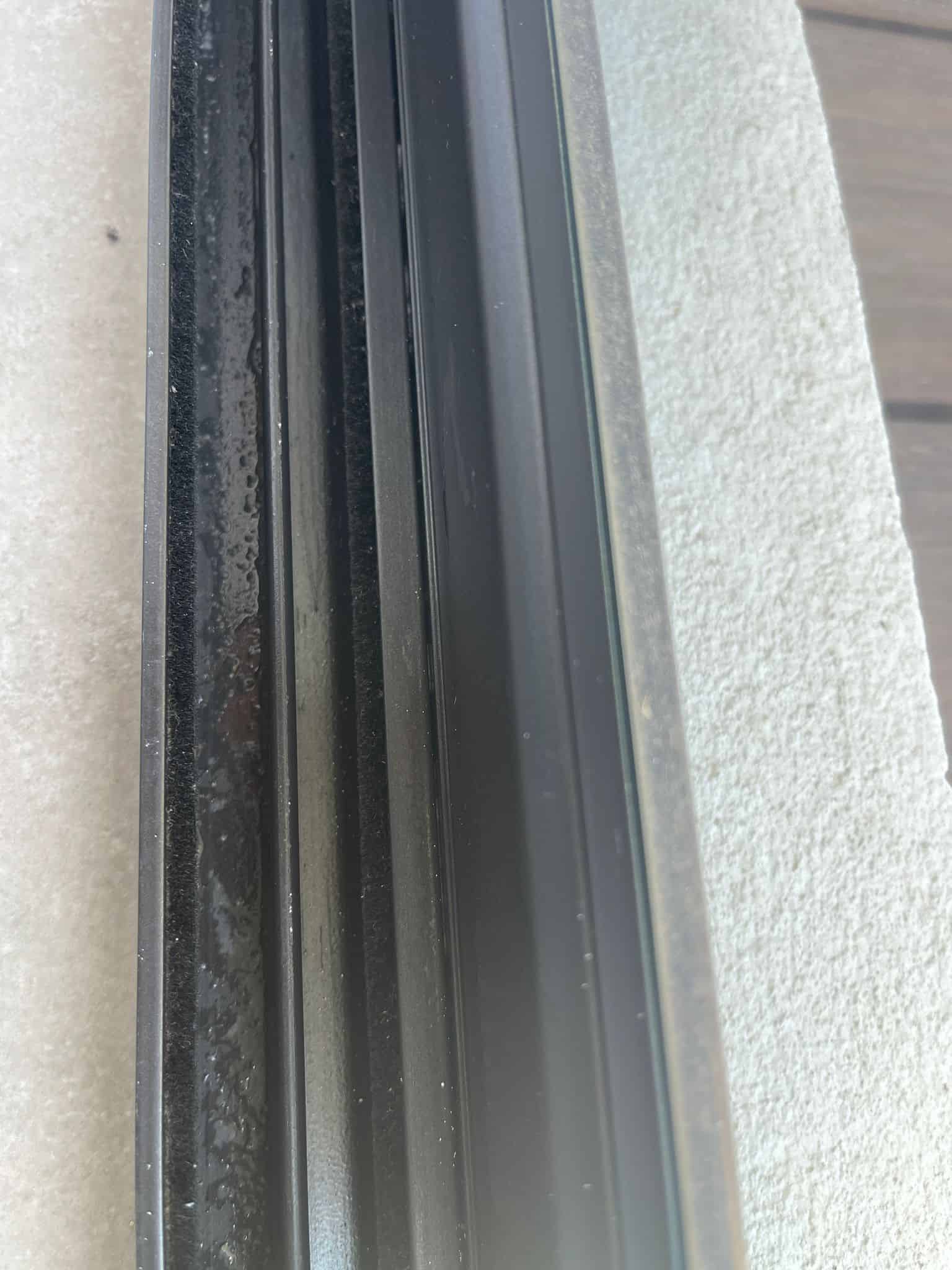 Sliding door track before Perth Shine Crew clean